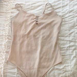 Pink bodysuit